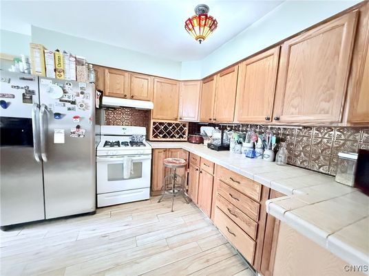 Interior, Kitchen, Tile Countertops, Wood Texture Flooring