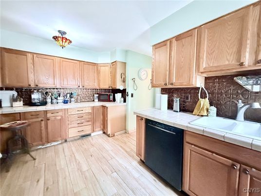 Interior, Kitchen, Tile Countertops, Wood Texture Flooring