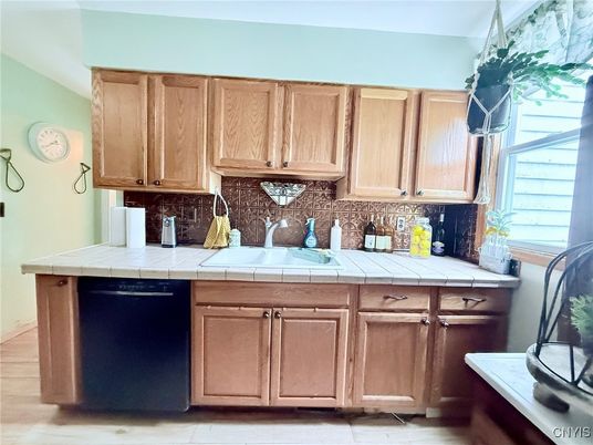 Interior, Kitchen, Tile Countertops, Wood Texture Flooring