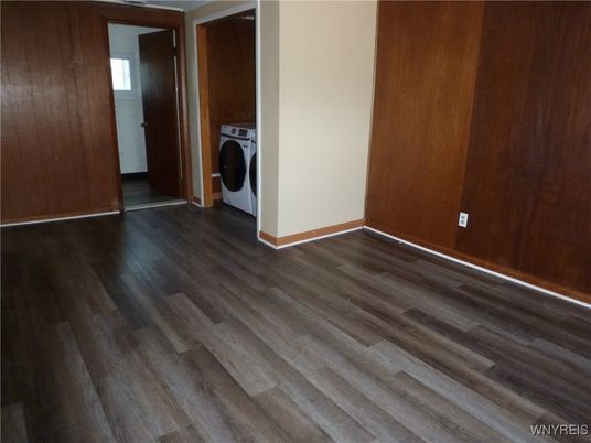 Empty room, Interior, Utility Closets, Washer, Wood Texture Flooring