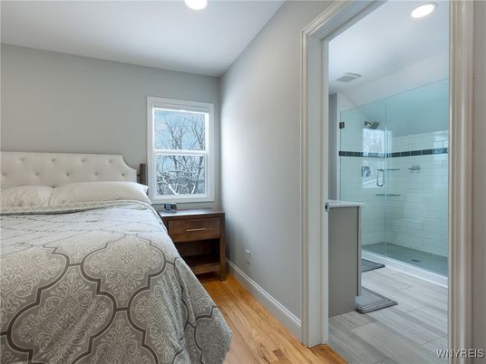 Bathroom, Bedroom, Glass Shower, Interior, Recessed Lighting, Wood Texture Flooring