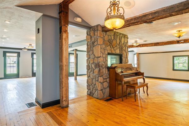 Fireplace, Interior, Pendant Lights, Piano, Recessed Lighting, Wood Texture Flooring