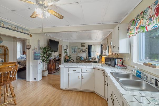 Interior, Kitchen, Tile Countertops, Wood Texture Flooring