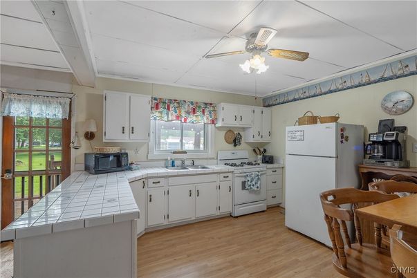 Interior, Kitchen, Tile Countertops, Wood Texture Flooring
