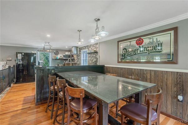 Dining room, Fireplace, Interior, Pendant Lights, Recessed Lighting, Wood Texture Flooring
