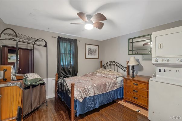Bedroom, Interior, Utility Closets, Washer, Wood Texture Flooring