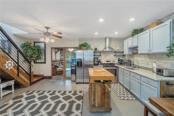 Interior, Kitchen, Recessed Lighting, Stainless Steel Appliances, Stone Walls