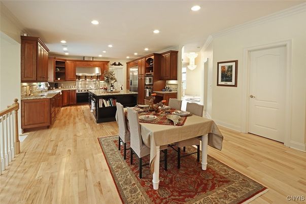Dining room, Interior, Kitchen, Pendant Lights, Recessed Lighting, Stainless Steel Appliances, Wood Texture Flooring