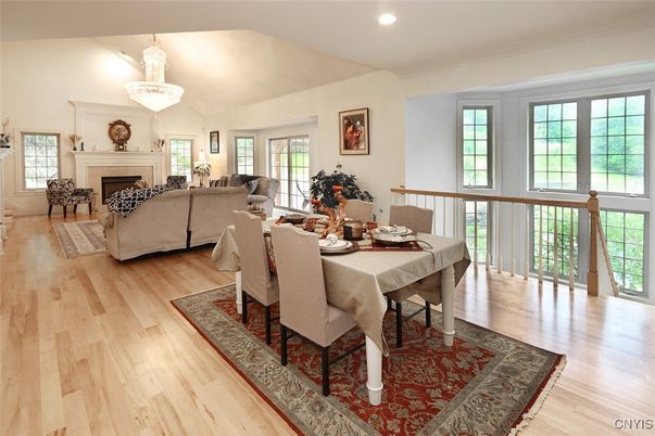 Chandelier, Dining room, Fireplace, Interior, Living room, Recessed Lighting, Wood Texture Flooring
