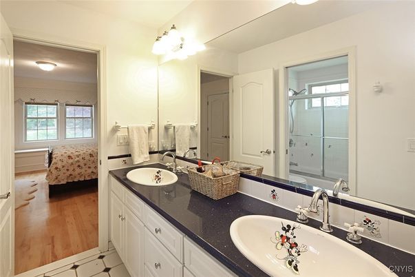 Bathroom, Dual Sink Vanities, Glass Shower, Interior, Wood Texture Flooring