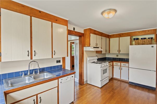 Interior, Kitchen, Tile Countertops, Wood Texture Flooring