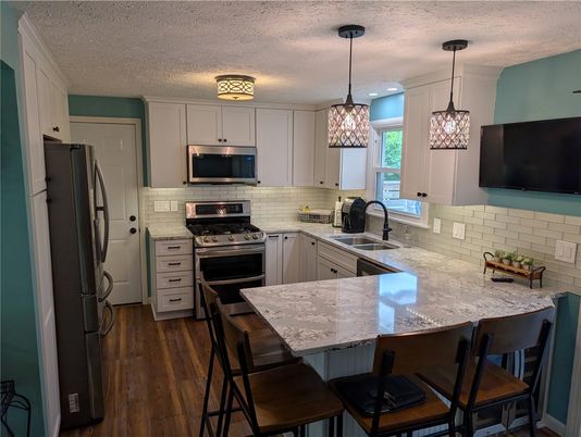 Interior, Kitchen, Pendant Lights, Recessed Lighting, Stainless Steel Appliances, Wood Texture Flooring