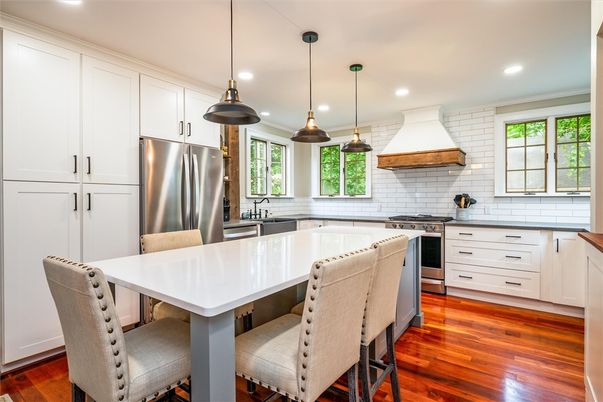 Interior, Kitchen, Pendant Lights, Recessed Lighting, Stainless Steel Appliances, Stone Walls, Wood Texture Flooring