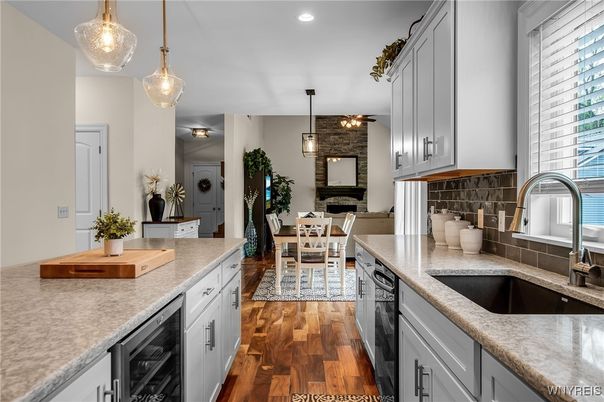 Dining room, Fireplace, Interior, Kitchen, Pendant Lights, Recessed Lighting, Stone Walls, Wood Texture Flooring