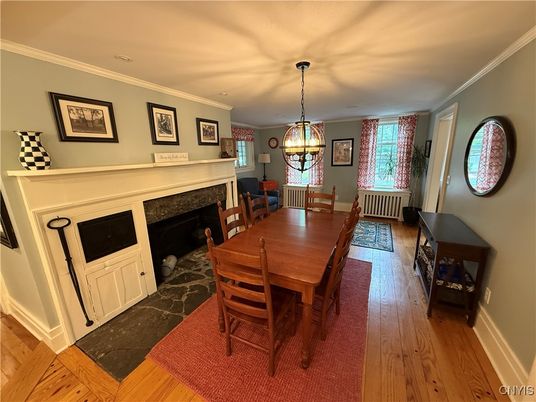 Chandelier, Dining room, Fireplace, Interior, Pendant Lights, Wood Texture Flooring