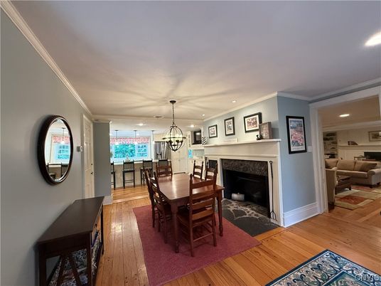 Chandelier, Dining room, Fireplace, Interior, Pendant Lights, Recessed Lighting, Wood Texture Flooring