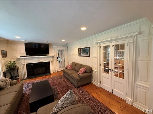 Fireplace, Interior, Living room, Recessed Lighting, Wood Texture Flooring