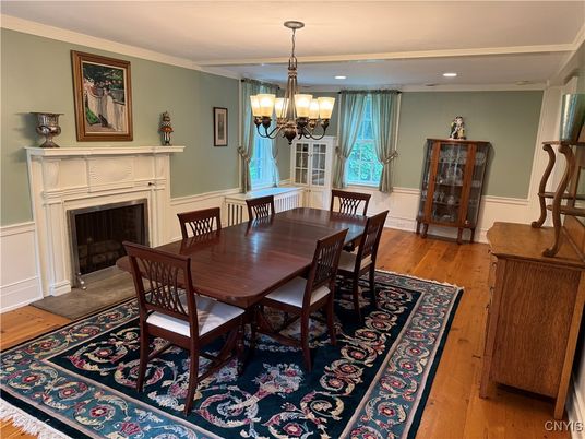 Chandelier, Dining room, Fireplace, Interior, Recessed Lighting, Wood Texture Flooring