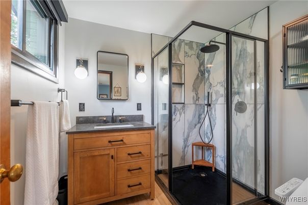 Bathroom, Glass Shower, Interior, Marble Walls, Wood Texture Flooring