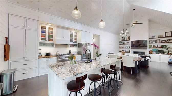 Dining room, Fireplace, Interior, Kitchen, Pendant Lights, Recessed Lighting, Stainless Steel Appliances, Wood Texture Flooring