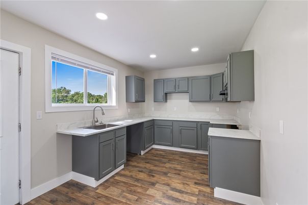 Interior, Kitchen, Marble Walls, Recessed Lighting, Wood Texture Flooring