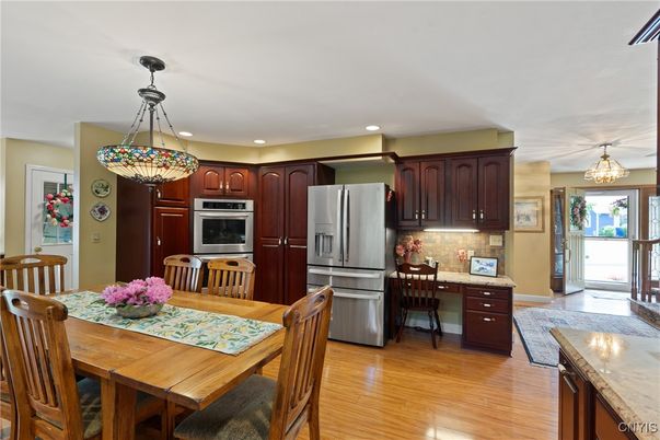 Dining room, Interior, Kitchen, Pendant Lights, Recessed Lighting, Stainless Steel Appliances, Wood Texture Flooring