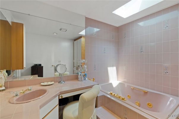 Bathroom, Dual Sink Vanities, Interior, Recessed Lighting, Tile Countertops