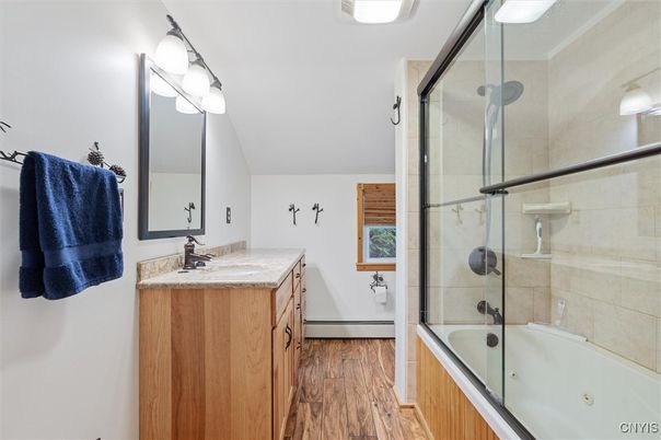 Bathroom, Dual Sink Vanities, Glass Shower, Interior, Wood Texture Flooring