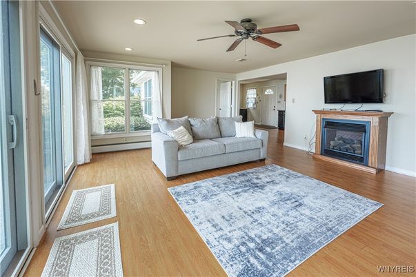 Fireplace, Interior, Living room, Recessed Lighting, Wood Texture Flooring