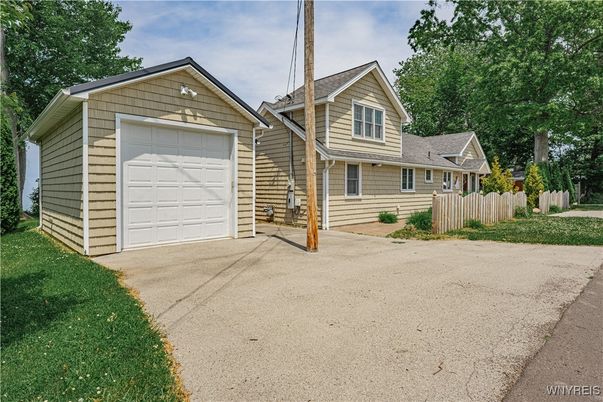 Attached, Exterior, Facade, Log Home