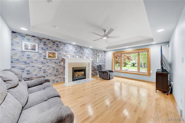 Fireplace, Interior, Recessed Lighting, Stone Walls, Wood Texture Flooring