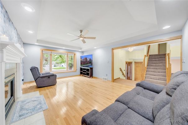 Fireplace, Interior, Living room, Recessed Lighting, Wood Texture Flooring