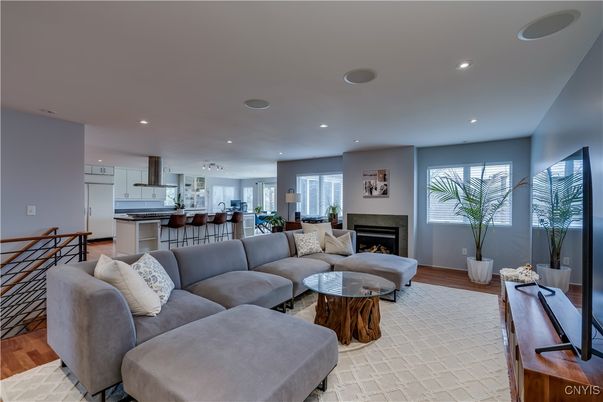 Fireplace, Interior, Kitchen, Living room, Recessed Lighting, Wood Texture Flooring