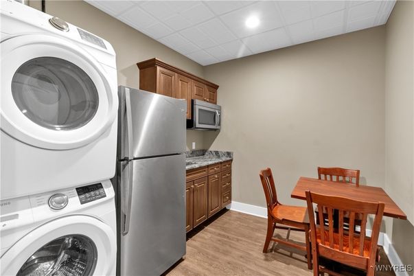 Dining room, Interior, Kitchen, Recessed Lighting, Washer, Wood Texture Flooring
