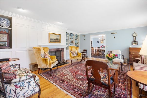 Dining room, Fireplace, Interior, Living room, Recessed Lighting, Wood Texture Flooring