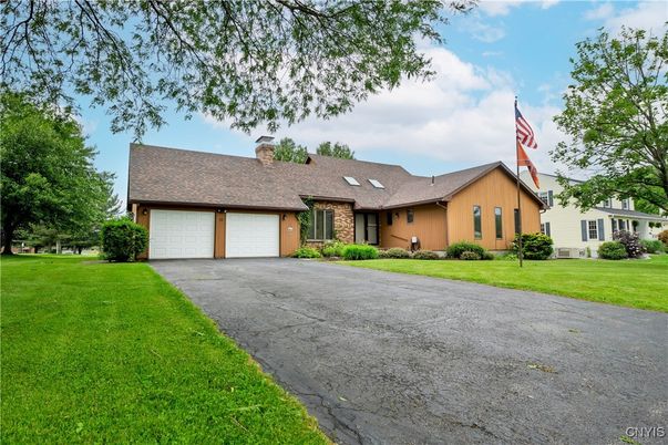 Attached, Backyard, Exterior, Facade, Brick Facade, Cape Cod