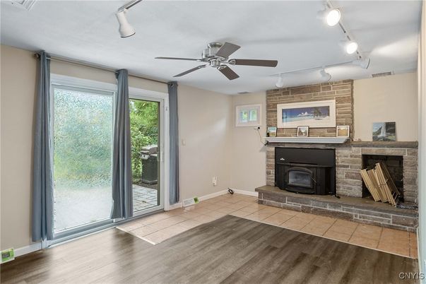 Empty room, Fireplace, Interior, Stone Walls, Wood Texture Flooring