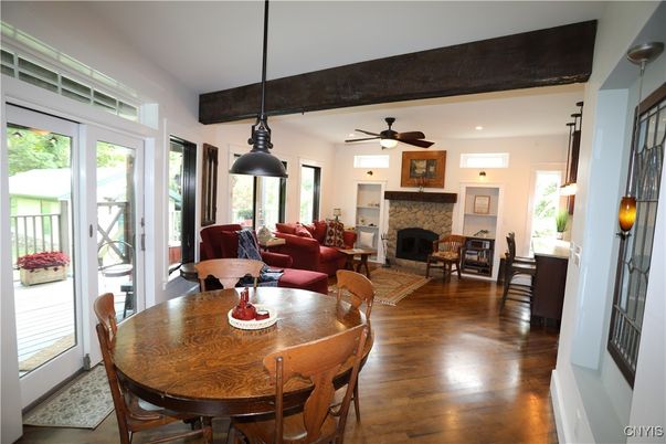 Dining room, Fireplace, Interior, Living room, Pendant Lights, Recessed Lighting, Wood Texture Flooring
