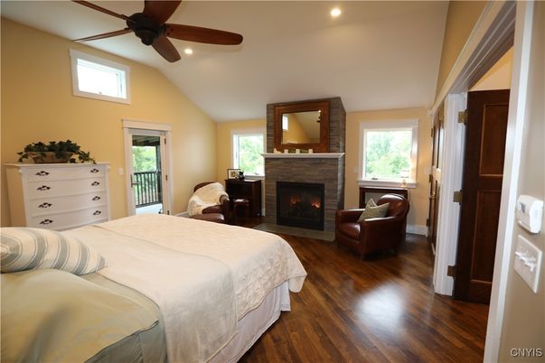 Bedroom, Fireplace, Interior, Recessed Lighting, Wood Texture Flooring
