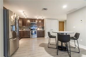 Dining room, Interior, Kitchen, Recessed Lighting, Stainless Steel Appliances, Wood Texture Flooring