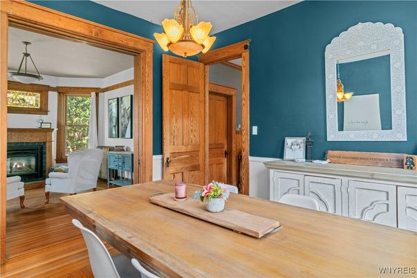 Dining room, Fireplace, Interior, Pendant Lights, Wood Texture Flooring