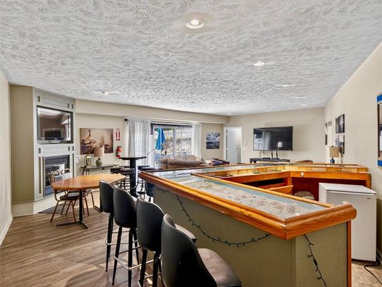 Dining room, Fireplace, Interior, Recessed Lighting, Wood Texture Flooring
