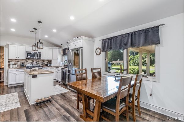 Dining room, Interior, Kitchen, Pendant Lights, Recessed Lighting, Stainless Steel Appliances, Wood Texture Flooring