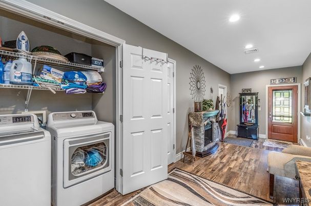 Fireplace, Interior, Recessed Lighting, Washer, Wood Texture Flooring