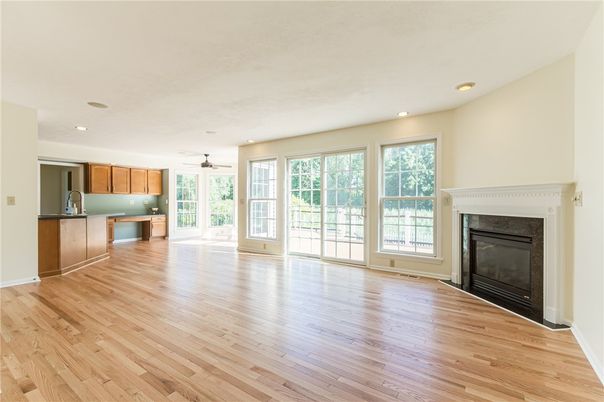 Empty room, Fireplace, Interior, Kitchen, Recessed Lighting, Wood Texture Flooring