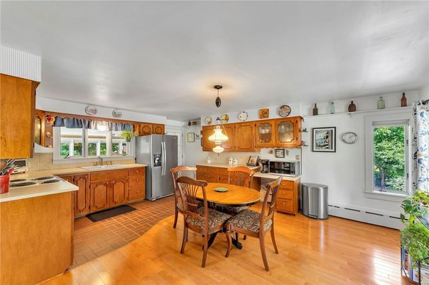Dining room, Interior, Kitchen, Pendant Lights, Stainless Steel Appliances, Wood Texture Flooring