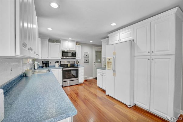 Interior, Kitchen, Recessed Lighting, Stainless Steel Appliances, Wood Texture Flooring