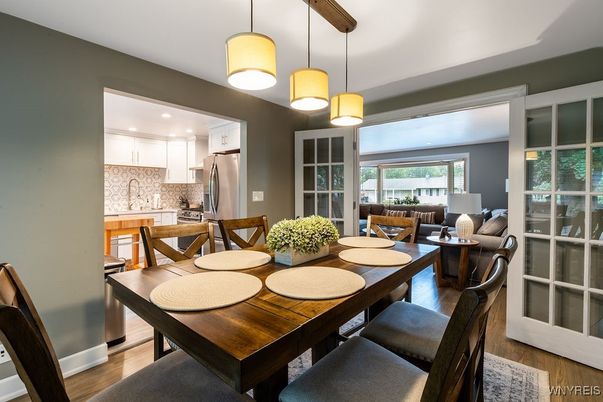 Dining room, Interior, Kitchen, Pendant Lights, Recessed Lighting, Stainless Steel Appliances, Wood Texture Flooring