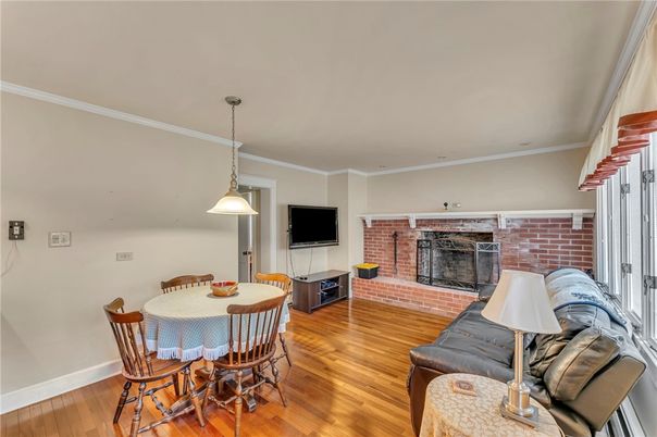 Dining room, Fireplace, Interior, Pendant Lights, Stone Walls, Wood Texture Flooring
