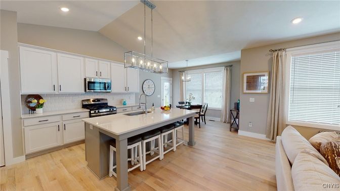 Dining room, Interior, Kitchen, Pendant Lights, Recessed Lighting, Stainless Steel Appliances, Wood Texture Flooring